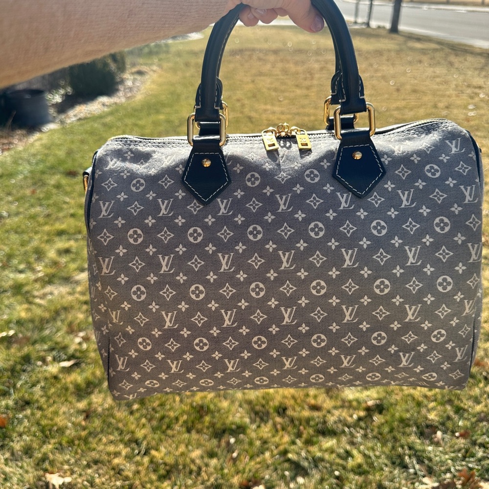 LOUIS VUITTON
Encre Monogram Idylle Canvas Speedy Bandouliere 30 Bag
